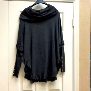 Gray cowl neck ruffle sweater with button detail.